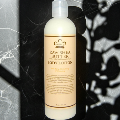 Raw shea butter lotion for deep moisturizing body care and soft skin.
