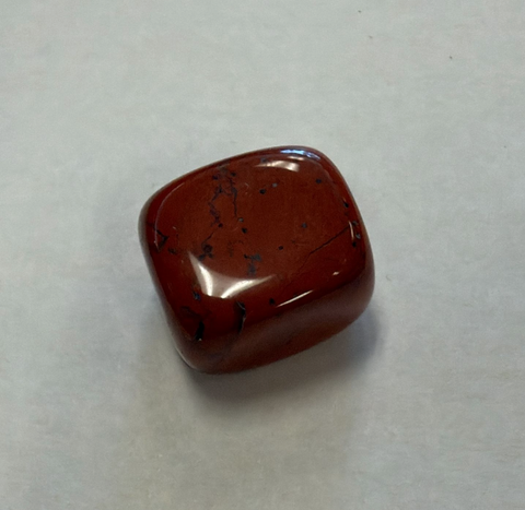 Red Jasper polished crystal stone for manifestation, grounding practice, and spiritual wellness routines.