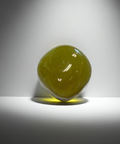 Serpentine tumbled stone crystal for meditation, grounding, and daily spiritual use.