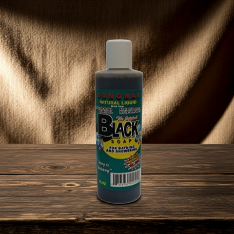 Songhai body wash with natural black soap formula for smooth and purified skin.