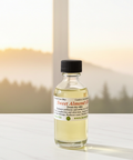Sweet almond oil commonly used for moisturizing skin and nourishing hair.