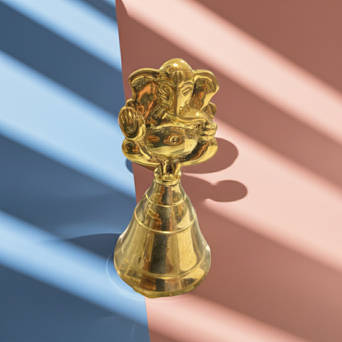 Traditional brass bell with Ganesha motif, ideal for temple rituals and prayer use.