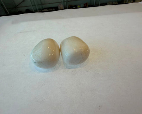 Tumbled Milky Quartz crystal with smooth glossy white finish