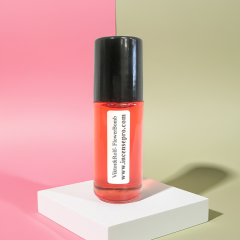 Viktor & Rolf Flowerbomb body oil bottle for moisturizing skin and layering with floral fragrance.