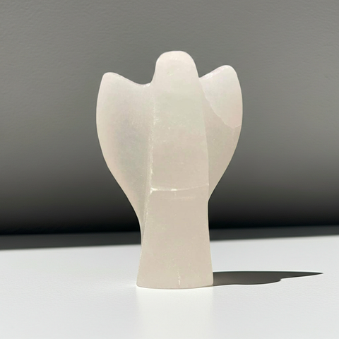 White Selenite angel small carving for altar decor, chakra cleansing, and peaceful spiritual practice.