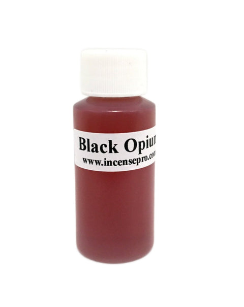 Black Opium Burning Oil bottle with dark coffee vanilla floral fragrance