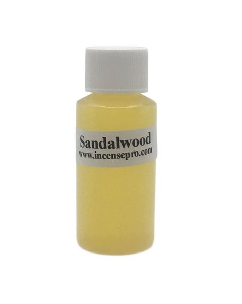 Sandalwood Burning Oil bottle with warm creamy woody serene meditative fragrance