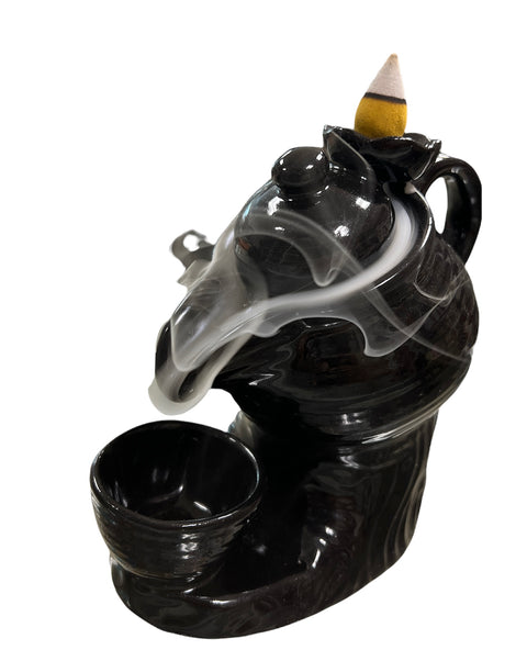 Magical Tea Pot waterfall backflow incense burner with mist pouring from teapot spout