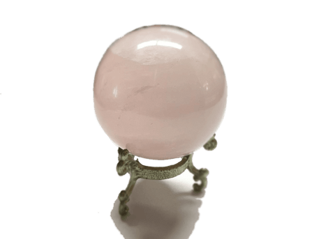 Natural rose quartz sphere stone for heart chakra work, meditation sessions, and spiritual wellness use.