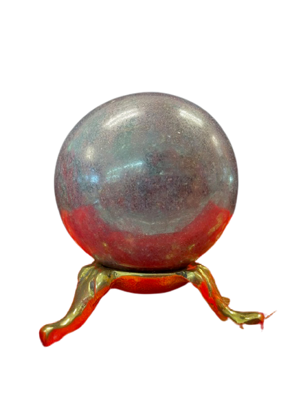 Polished Star Ruby crystal ball for scrying, meditation practice, and metaphysical use.