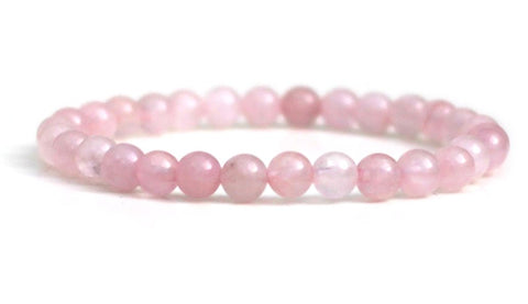 Rose Quartz Bracelet beaded crystal worn for meditation, emotional healing, and daily self-love practice.